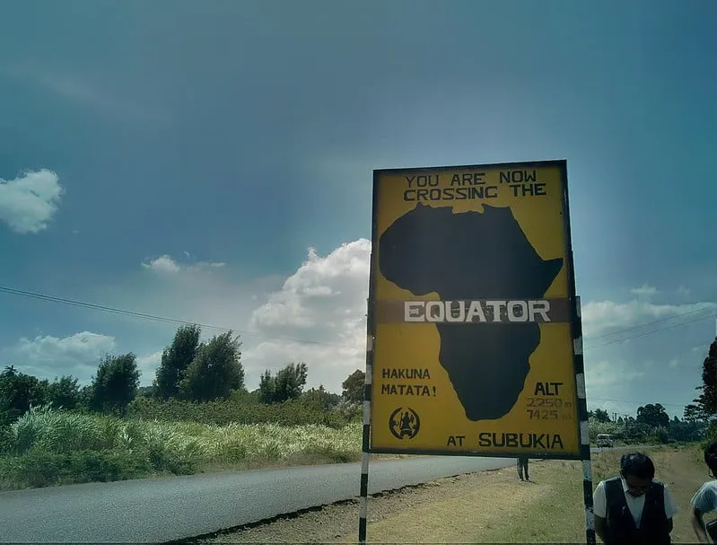 Road sign marking the Equator crossing in Kenya — a popular photo stop on safari drives