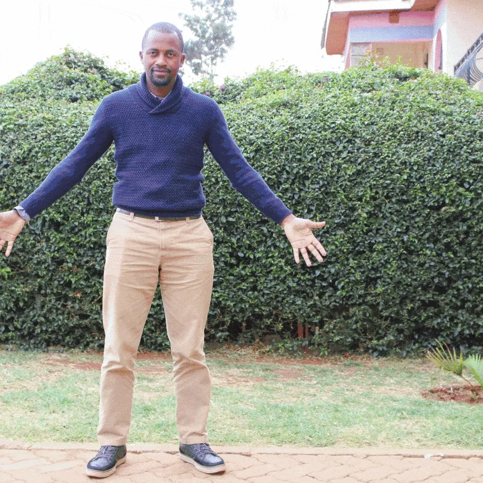 Author dressed for a cold August day in Nairobi showing appropriate casual clothing for men