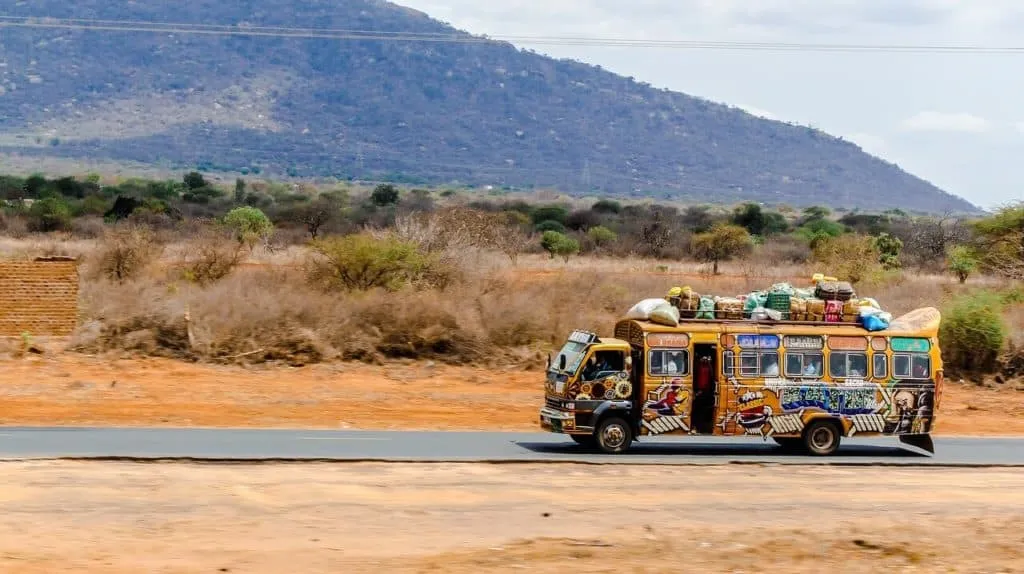 A Matatu on a Kenyan road, The best way to travel around Kenya on a Shoestring Budget