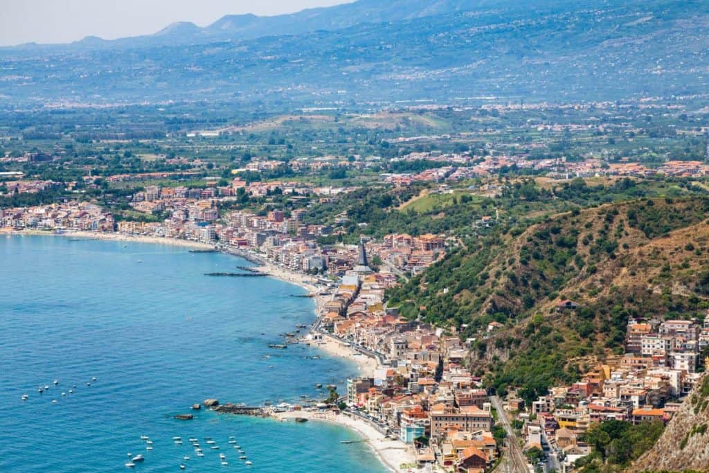 Staying Safe As A Tourist In Mombasa 10 Common Sense Tips   View Of Giardini Naxos Town On Ionian Sea Beach P4U7T55 Resized 1024x683 